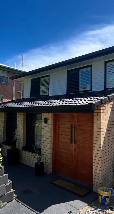 Exterior painting on a Queensland home